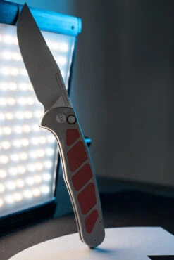 LuvThemKnives Rezult Button Lock, Finger Flicker & Flipper Pocket Knife Titanium Handle Burgundy G10 Inlay 20CV Steel LTK-609-1 -Sharp Knife Shop DSC0800 33627.1691170665